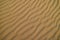 Impressive sand ripple pattern on the sand dune of Huacachina desert, Ica, Peru