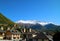 Impressive Scenery of Group of Medieval Svan Tower-houses in Mestia Town with Snow-capped Caucasus Mountains