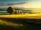 Impressive springtime scene with cypress trees, farmland, and undulating hills.