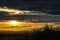 Impressive sunset with storm clouds towering in distance in northern Angola, Africa