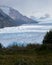 Impressive vertical photo of the Perito Moreno Glacier located in the Andes Mountains in Patagonia Argentina