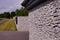 Impressive and very durable fence of the property made of split granite. Fence