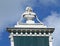 Impressive Vintage Building`s Rooftop Decoration against Blue Cloudy Sky