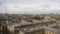Impressive wide city view of Paris from above Notre Damme roof