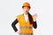 Imressed and surprised asian female construction manager pleased with amazing quality, standing in safety helmet and