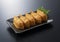 Inari Sushi on a black background