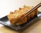 Inari Sushi set against a wooden background