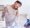 Inattentive husband burning clothing while ironing