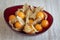 Inca berries Physalis in a red bowl.