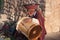 Inca descendent Musician playing a drum horn Chinchero market Cusco Peru UNESCO world heritage city