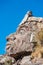 Inca face sculpture peruvian Andes at Puno Peru