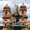 Inca Pachacutec on fountain and catholic church