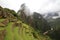 The Inca terraces of Machu Picchu and clouds