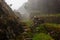 Inca Trail trekking path with fog.