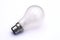 Incandescent tungsten pearl B22 bayonet fitting light bulb on white