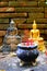 Incense and Buddha statue at Wat Lok Moli, Buddhist temple, Chiang Mai, Thailand