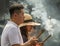 Incense burning during prayer in Asia