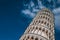 INCLINE Pisa tower from many different perspectives, duomo, blue sky with clouds, sun flare, wide angle photo, bottom and side vie