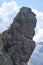 Inclined rock tower on via ferrata Delle Trincee meaning Way of the trenches, Padon Ridge, Dolomites mountains, Italy.