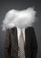Incognito concept, faceless businessman with head in clouds