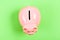 Income management. planning budget. financial problem. piggy bank on green background. money saving. top view of money