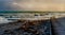 The incoming sea reaching the beach in south east Cornwall