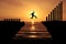 Increase earning and productivity By taking a big risk. Silhouette of a business man jumping over the cliff to attempt More profit