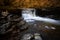 Incredible long exposure of a waterfall in Brecon Beacons National Park at sunset in Wales, UK