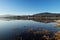 Incredible mirror on water surface on water dam near Frydek-Mistek, czech republic. Sunrise on Olesna dam. Reservoir with blue sky