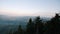 Incredible mountain landscape with countryside at sunset. Carpathian mountains in dusk at summer. Beautiful mountain horizon