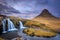 Incredible Nature landscape of Iceland. Fantastic picturesque sunset over Majestic Kirkjufell (Church mountain) and waterfalls.