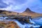 Incredible Nature landscape of Iceland. Fantastic picturesque sunset over Majestic Kirkjufell (Church mountain) and waterfalls.