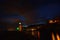 Incredible night view of the seaside town of Camogli with lights, colors and reflections in a magical atmosphere