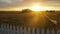 Incredible orange bright sunset over grassland in Australia in the summer, pedestal up shot