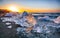 Incredible pieces of the iceberg sparkle on famous Diamond Beach at  Jokulsarlon lagoon during sunset