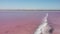 Incredible pink salty sands of Kuyalnik estuary, Odessa, Ukraine. Black Sea Kuyalnik estuary. Drying estuary, water colored with a
