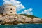 Incredible seascape. Old tower on a rocky shore by the sea, Boka-Kotor Bay,