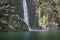 Incredible Stirling Falls with double rainbow, Milford Sound, Fiordland, South Island, New Zealand