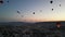 Incredible sunrise and balloons over the hills in Cappadocia. The view from the drone.