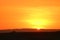 Incredible sunset over the sand dunes of Huacachina desert with the silhouette of tourists dune buggy, Ica region, Peru