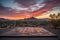 incredible sunset view from outdoor dance floor with mountains in the background