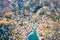 incredible view from the drone of the Bay and the houses of the Greek island. colorful houses, yachts and boats on pier. Greece