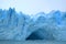 Incredible view of the ice blue Perito Moreno Glacier`s huge front wall as seen from cruise boat on Lake Argentino, El Calafate