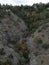 Incredible view of the Millomeris Waterfall among the fascinating forest. The view from the drone. Amazing view in Cyprus.