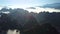 Incredible view mountain tops protrude through white clouds