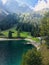 Incredible view of the mountains and the emerald lake at Salzkammergut land in the Austrian Alps.