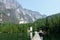 An incredible view of princess louisa inlet and chatterbox falls from the dock with boats tied up, in British Columbia, Canada.