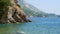 Incredibly beautiful pristine nature of Montenegro, rocky coastline, mountains and clear turquoise Mediterranean Sea