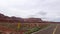 Incredibly beautiful spring landscape in Utah. Road driving POV. Geological formation weather water erosion. Nature