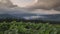 Incredibly beautiful time-lapse of a mountain at dusk or dawn, when clouds form and pass over the mountain peaks.